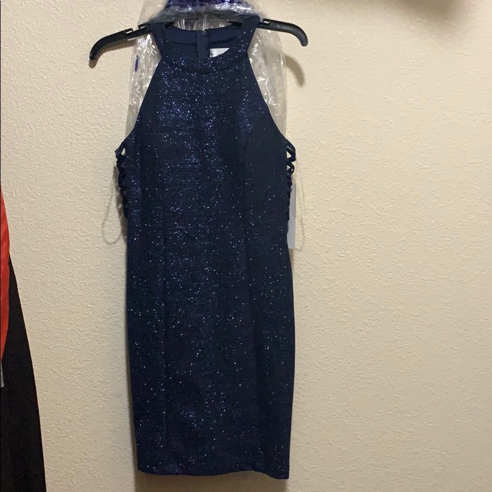 Blue glittery dress.